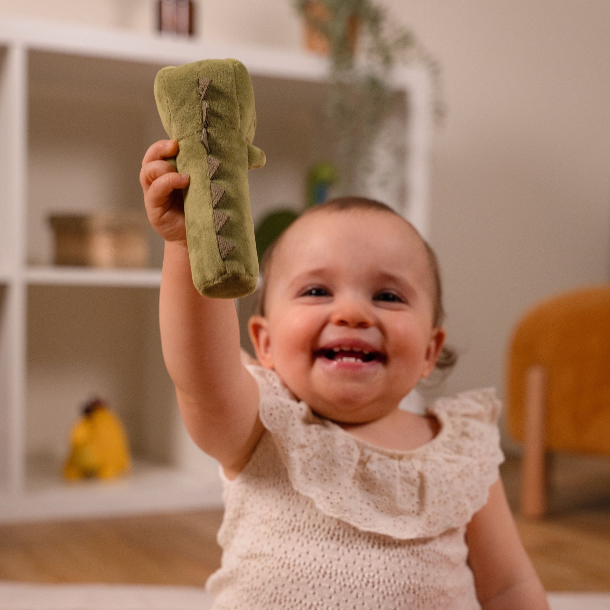 Baby playing with Squeaker Rattle - Rex the Tyrannosaurus