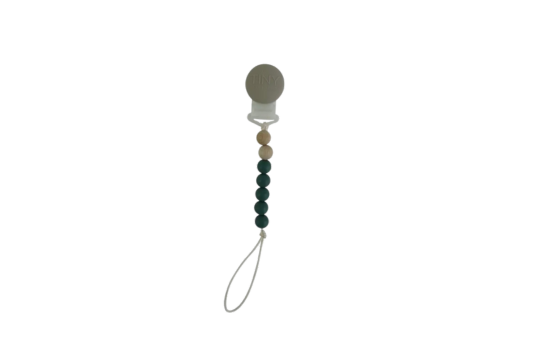 Tiny Teethers mini pacifier clip is perfect for the mini in your life. This innovative silicone clip is designed with a few moving parts and no metals. This allows your baby to teethe on the clip itself unlike the metal ones. Designed with fewer medium weight beads, our pacifier clip won't pull the soother out of your little baby's mouth. It will also stay clipped to your baby's clothing, preventing you from losing the soother or having it fall to the ground and get dirty in the moment you need it most.