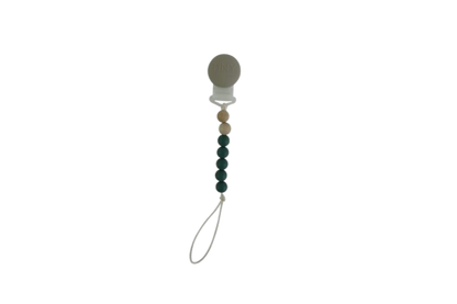 Tiny Teethers mini pacifier clip is perfect for the mini in your life. This innovative silicone clip is designed with a few moving parts and no metals. This allows your baby to teethe on the clip itself unlike the metal ones. Designed with fewer medium weight beads, our pacifier clip won't pull the soother out of your little baby's mouth. It will also stay clipped to your baby's clothing, preventing you from losing the soother or having it fall to the ground and get dirty in the moment you need it most.
