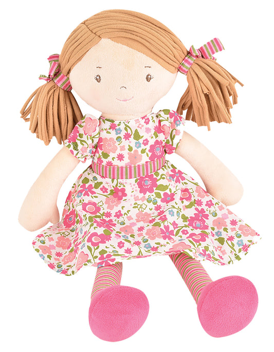 A charming, adventure-loving doll who enjoys tea parties, cake and cucumber sandwiches, always dressed to impress.

Height: 15.7, with a soft body, embroidered features, and printed clothing.

Perfect for ages 0+ months