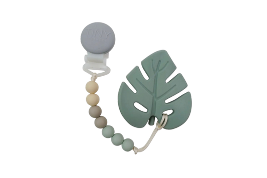 Key Features:
Safe for Baby: Made from non-toxic materials, this teether is free from harmful chemicals, providing peace of mind for parents.
Stylish Design: The leaf shape and beaded strand create an attractive accessory that can be easily attached to pacifiers or diaper bags, making it convenient for on the go soothing.
Comfortable Grip: The soft silicone material is gentle on your baby’s gums, making it ideal for teething relief.
Easy to Clean: Simply wash with soap and water or place in the dishwasher 