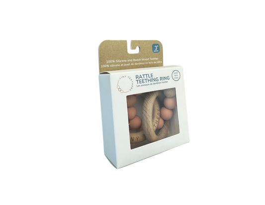 Soothe &amp; stimulate your baby with this natural teething set! Silicone peach teether &amp; beechwood rattle rings help develop motor skills &amp; senses through grasping, textures. 100% safe for 3+ months.