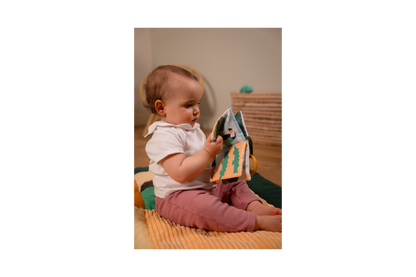 Baby playing with Soft Baby Book - Jungle
