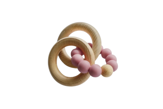 Soothe &amp; stimulate with Tiny Teethers' silicone rose teether &amp; beechwood rattle rings. 100% safe materials aid baby's development of motor skills &amp; senses through grasping/textures. Ideal for 3+ months.